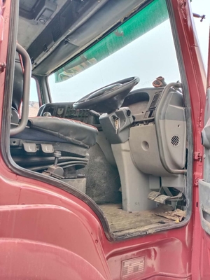 Gebruikte dumptruck HOWO 375 met originele verf en EPA-motor uit Japan bij Restaurant
