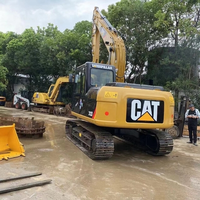 Caterpillar 312D-graafmachine in goede staat met een werkgewicht van 20 ton