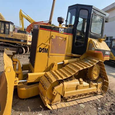 Gebruikte CAT D5M-bulldozers uit Japan met hydraulische cilinder