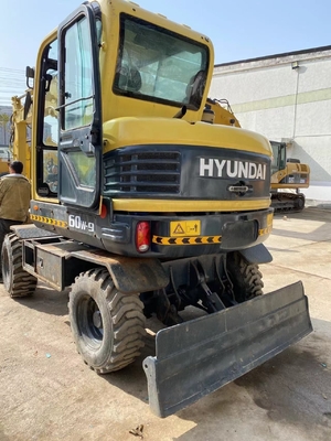 Gebruikte KOREA HYUNDAI R60W-9 wielgraver 6ton Crawler Digger voor bouwprojecten
