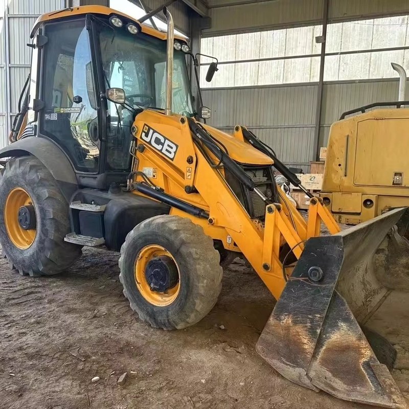 Laag werktijd JCB 3CX boormachine met originele Britse motor met bewegende wielen